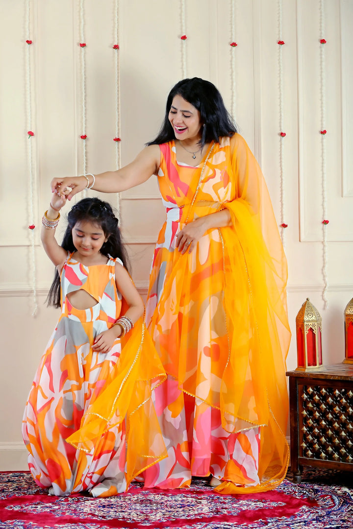 Stylish Orange and White Multifloral Gown with Matching Kurta Pyjama and Jacket ( Family Twin Set )