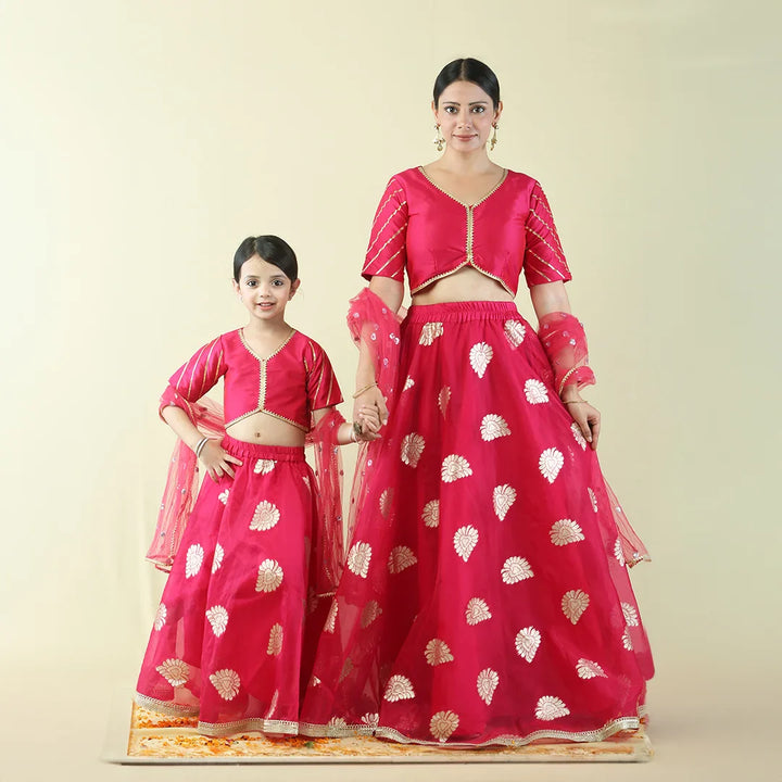 Fuchsia Pink and Golden Brocade Lehenga Choli Mom and Daughter Twin Set