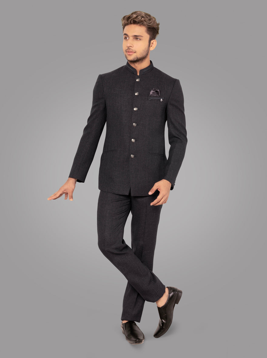 Navy blue self-textured jodhpuri suit with full sleeves for sangeet.