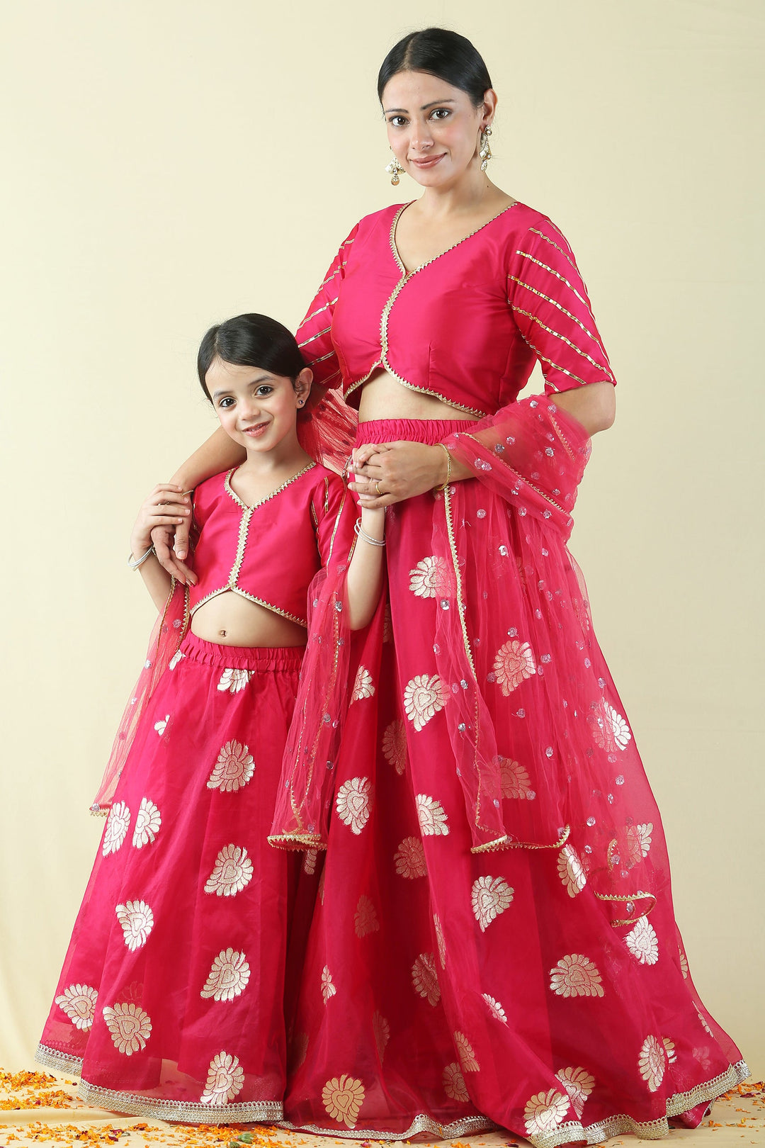 Fuchsia Pink and Golden Brocade Lehenga Choli Mom and Daughter Twin Set