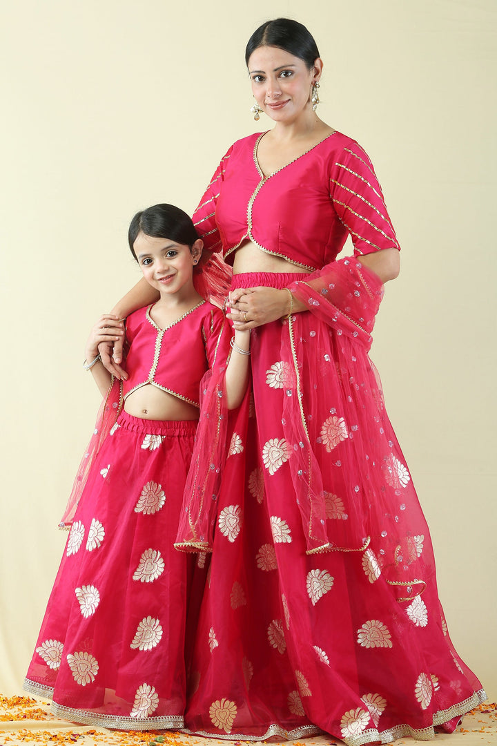 Fuchsia Pink and Golden Brocade Lehenga Choli Mom and Daughter Twin Set
