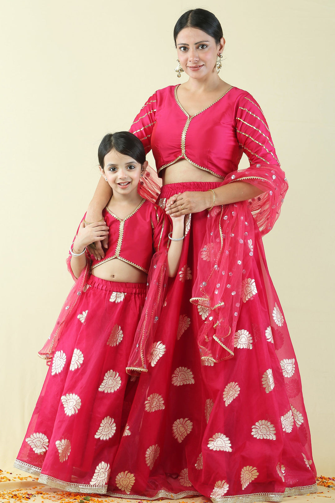Fuchsia Pink and Golden Brocade Lehenga Choli Mom and Daughter Twin Set