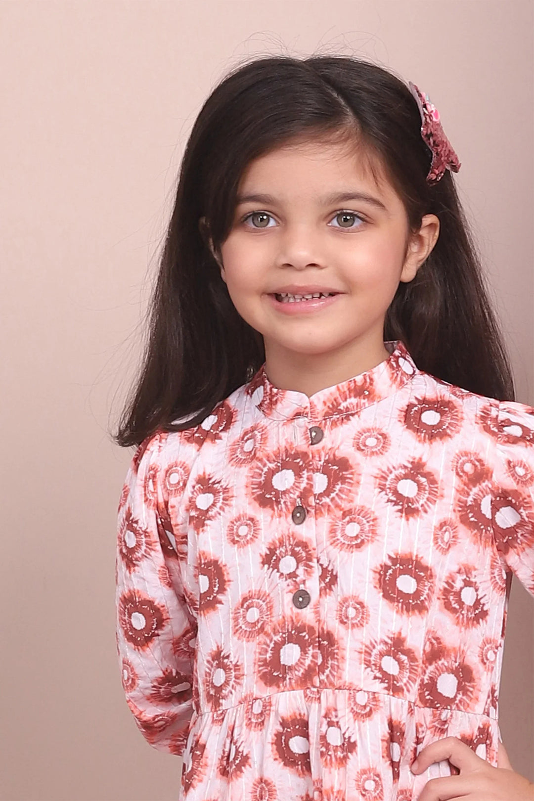Cute and Cozy: Matching Mommy and Me Orange Printed Tiered Dress Duo