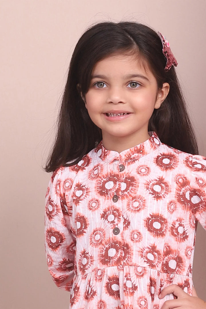 Cute and Cozy: Matching Mommy and Me Orange Printed Tiered Dress Duo