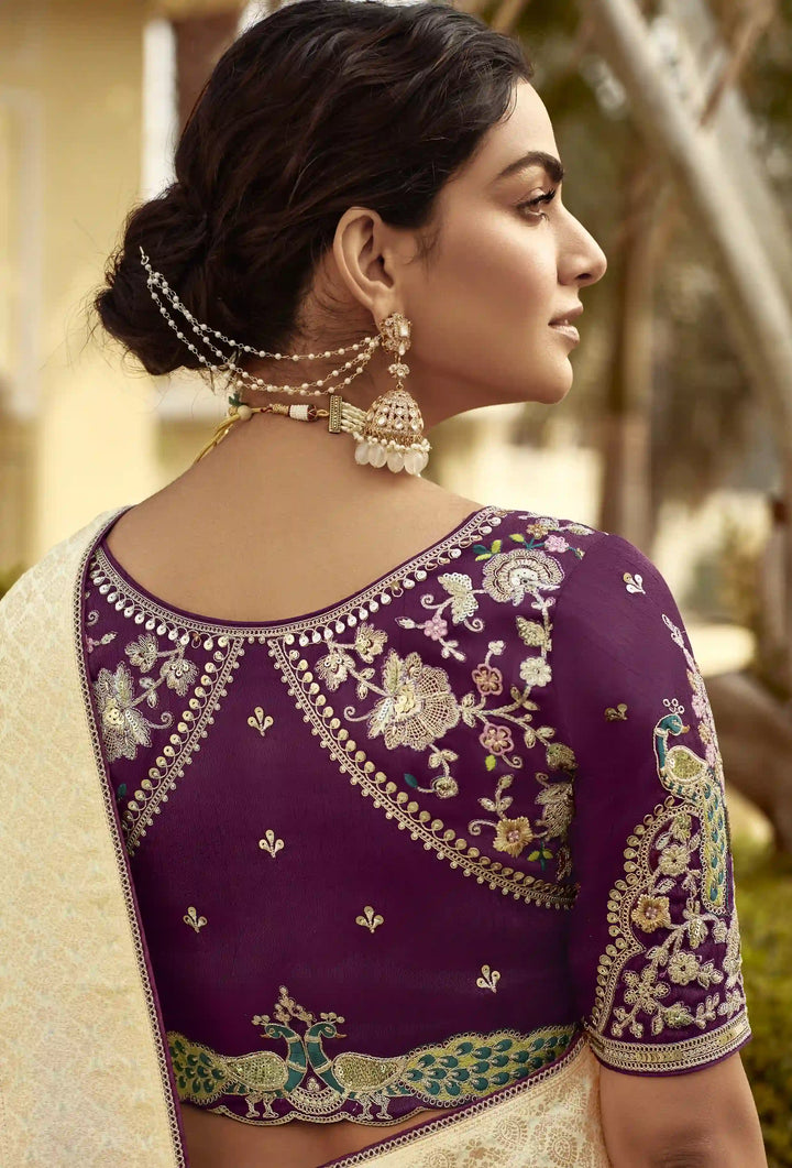 Graceful Dola Silk Saree with Weaving and Embroidery Detailing