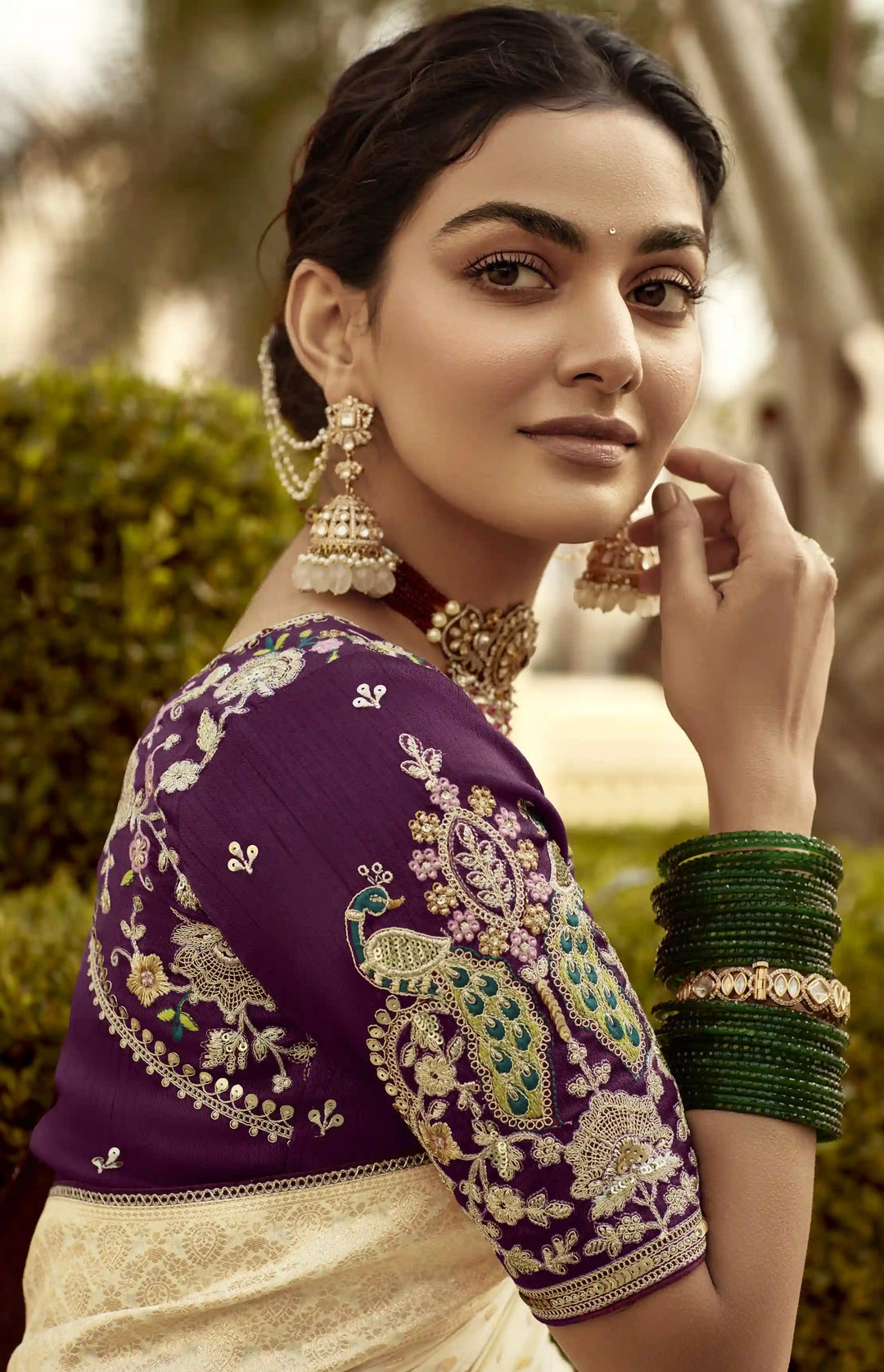 Graceful Dola Silk Saree with Weaving and Embroidery Detailing