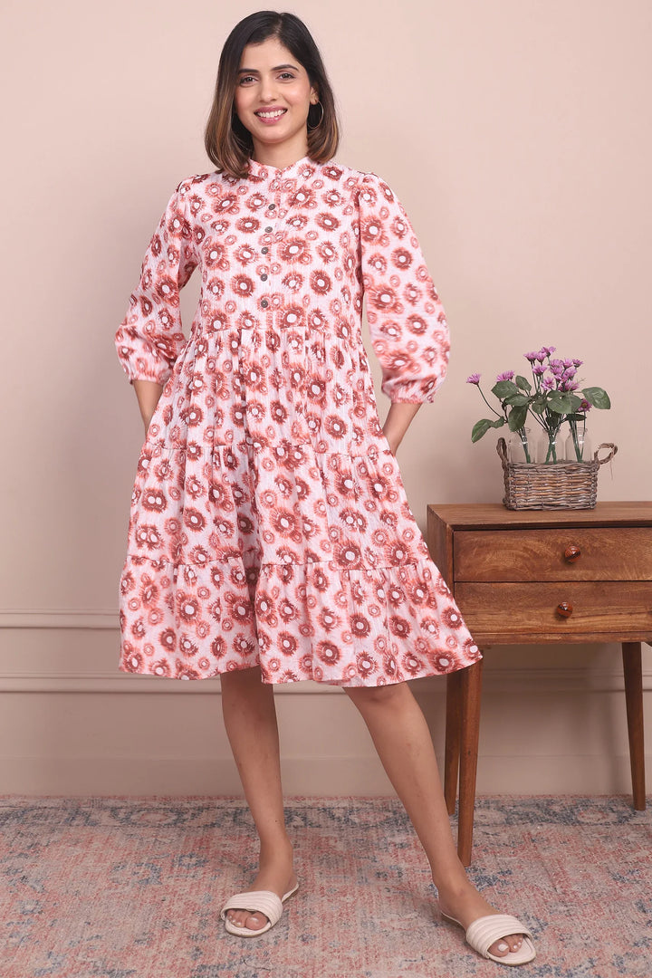 Cute and Cozy: Matching Mommy and Me Orange Printed Tiered Dress Duo