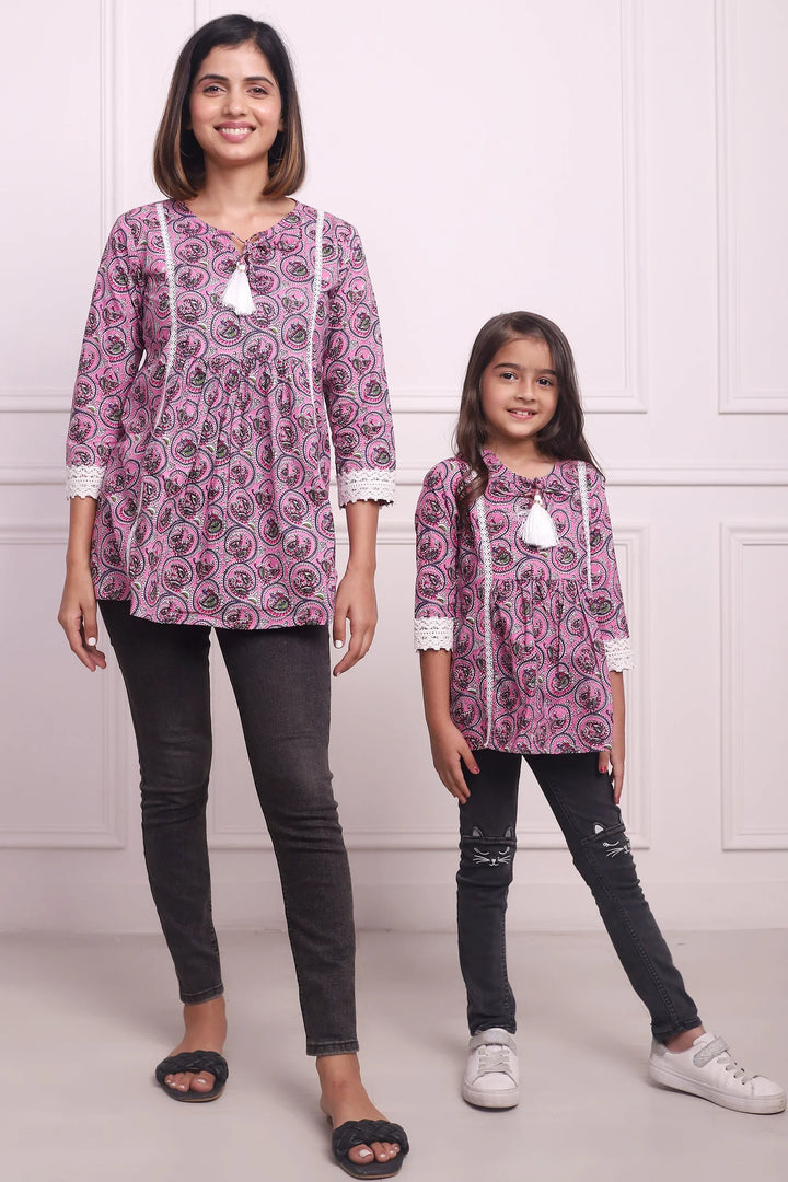 Elegant Petals: Mom and Daughter Twin Set in Baby Pink Floral Print