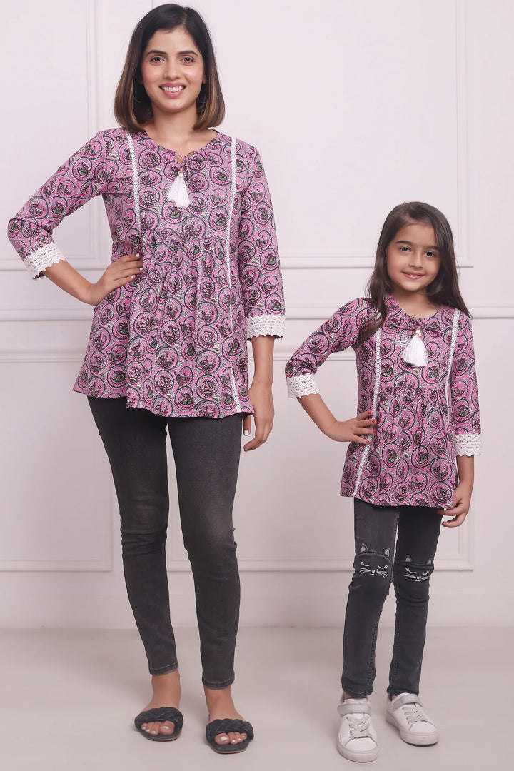 Elegant Petals: Mom and Daughter Twin Set in Baby Pink Floral Print