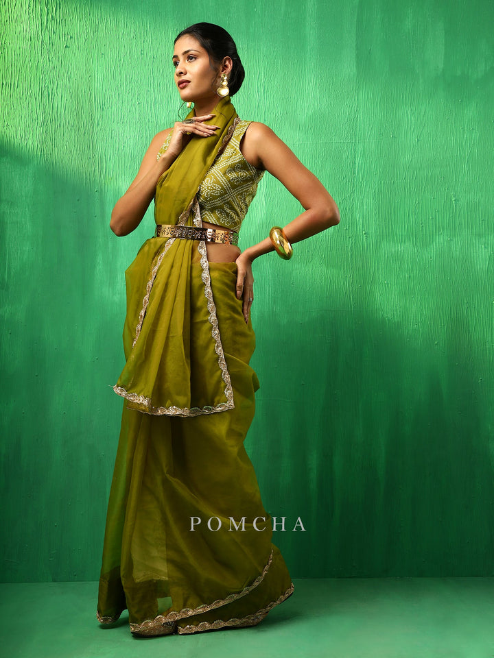 Exquisite Adaa Mehendi Green Organza Saree | Soft Cotton Blouse Pair
