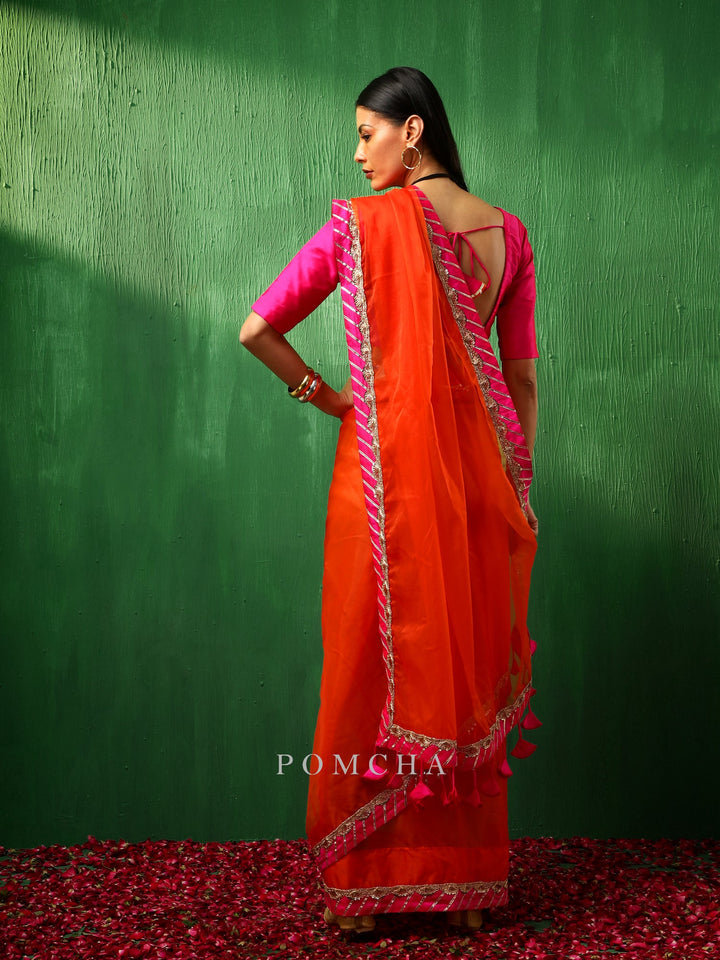 Adaa pink border | orange organza saree edition