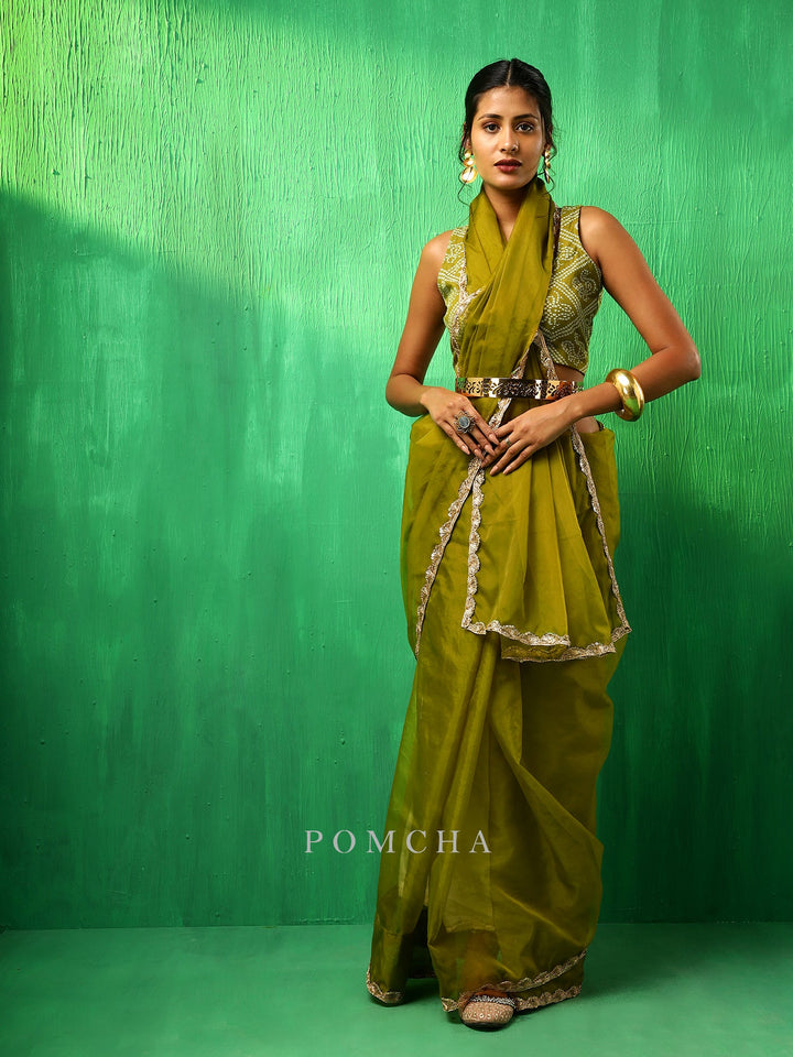 Exquisite Adaa Mehendi Green Organza Saree | Soft Cotton Blouse Pair