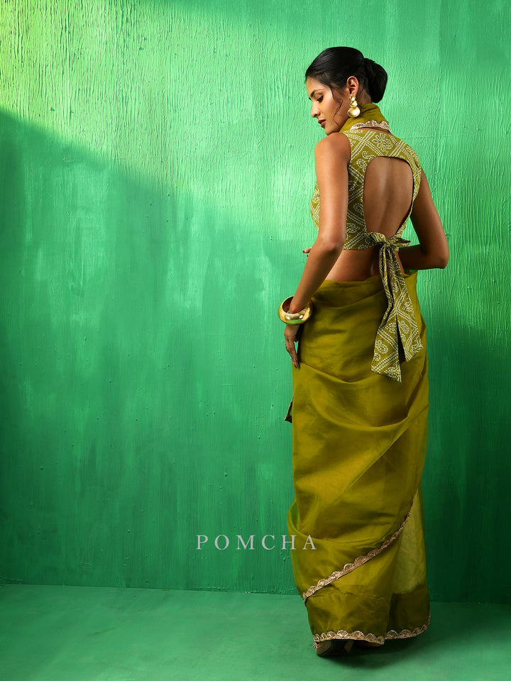 Exquisite Adaa Mehendi Green Organza Saree | Soft Cotton Blouse Pair