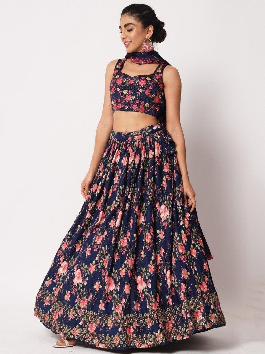 Traditional navy blue lehenga set with floral design and sequins work.