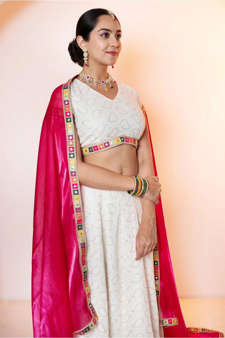 Sparkling White Emroidered Lehenga Choli with Pink Dupatta