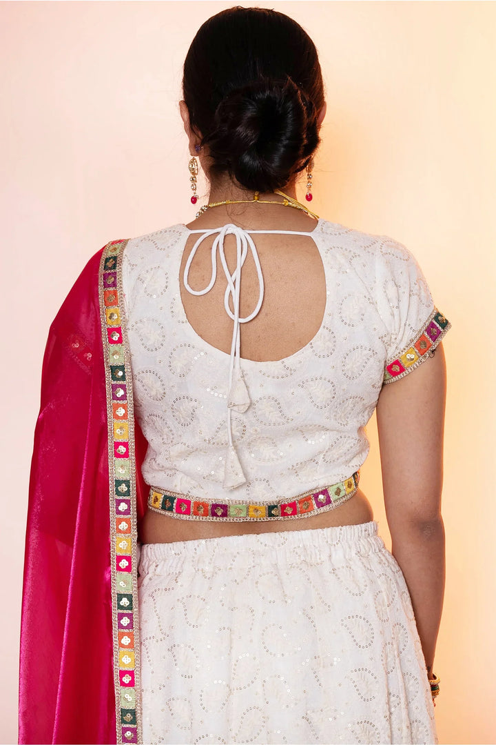 Sparkling White Emroidered Lehenga Choli with Pink Dupatta