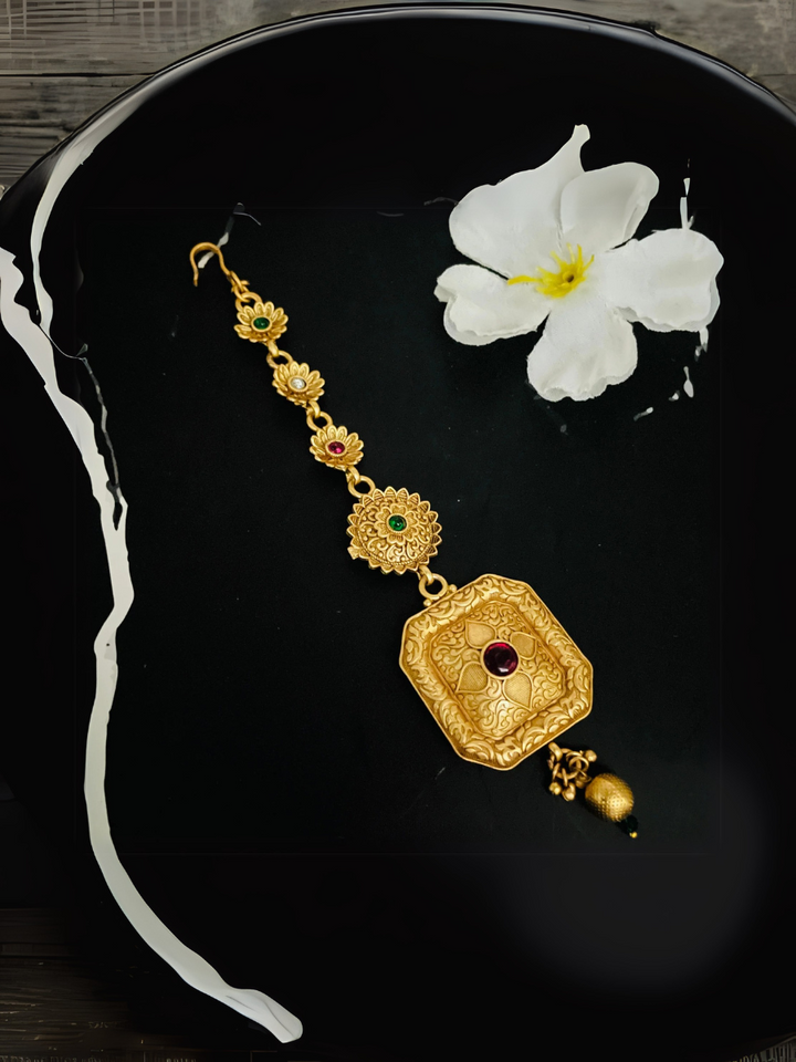 Golden Tika | Traditional Indian Jewelry for Festivals & Celebrations