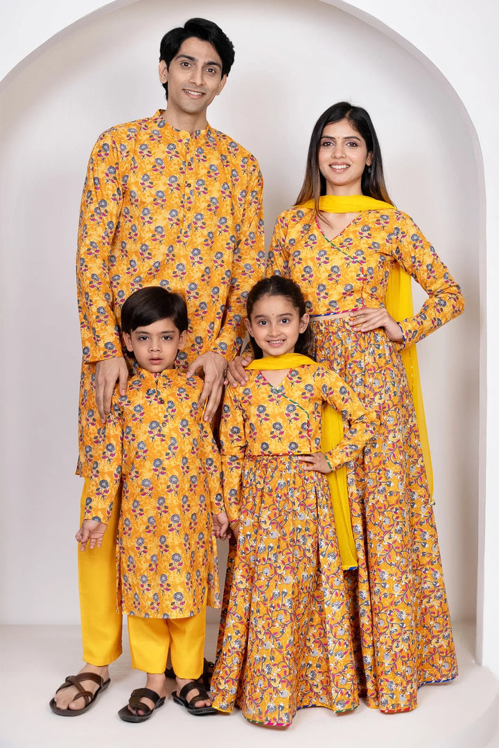 Mustard Printed Lehenga Choli and Dupatta with Matching Kurta Pyjama Set for Family
