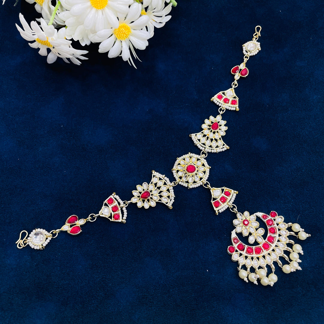 Elegant matha patti featuring intricate Kundan stones, ideal for celebrations.