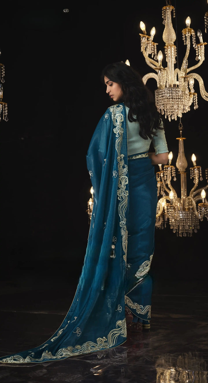 Designer Teal Blue Saree with Embroidery & Fancy Tassels for Party Wear
