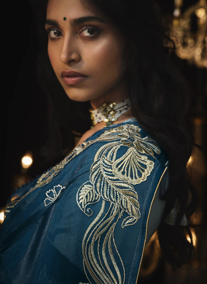 Designer Teal Blue Saree with Embroidery & Fancy Tassels for Party Wear