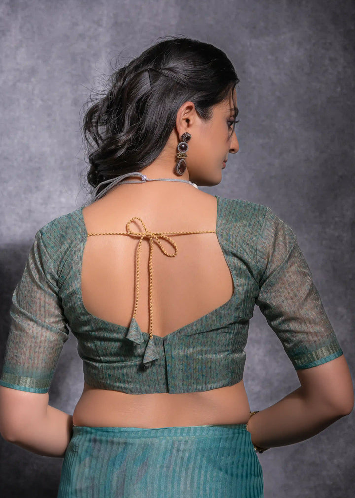 Elegant Linen Saree in Teal Blue with Rich Zari Detailing
