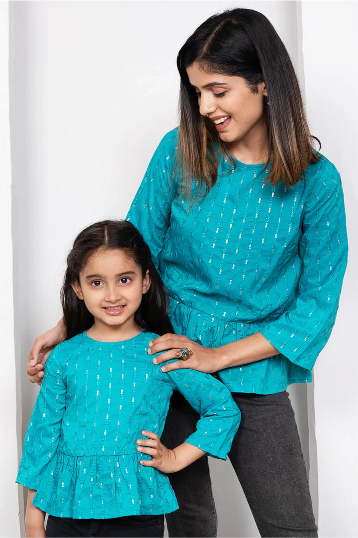Twinning in Style: Blue & Silver Peplum Tops for Mom & Daughter