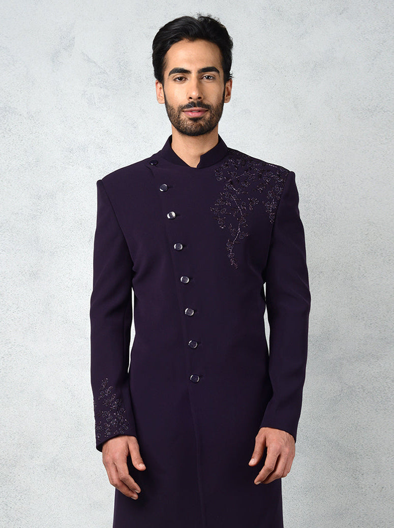 Purple Indo-Western for men with angrakha style and hand embroidery details.