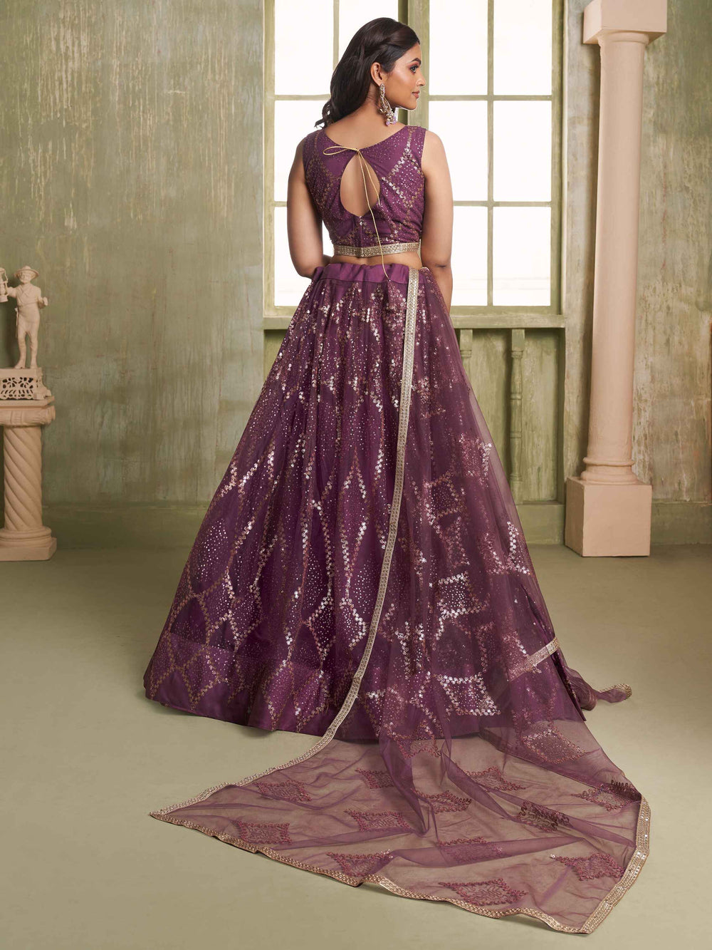 Attractive Wine Sequins Net Party Wear Lehenga Choli With Dupatta