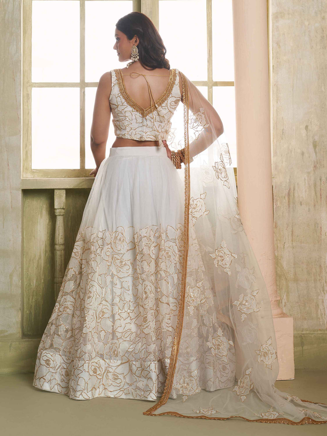 Amazing Off-White Embroidered Net Wedding Wear Lehenga Choli