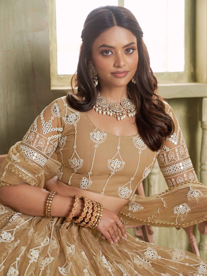 Dazzling Beige Sequins Net Engagement Wear Lehenga Choli