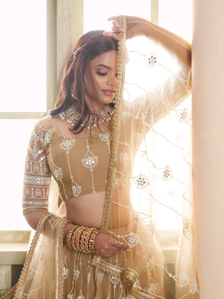 Dazzling Beige Sequins Net Engagement Wear Lehenga Choli