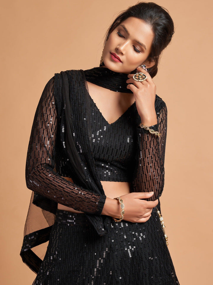 Stylish black lehenga with thread and sequins border on the dupatta for a graceful look.