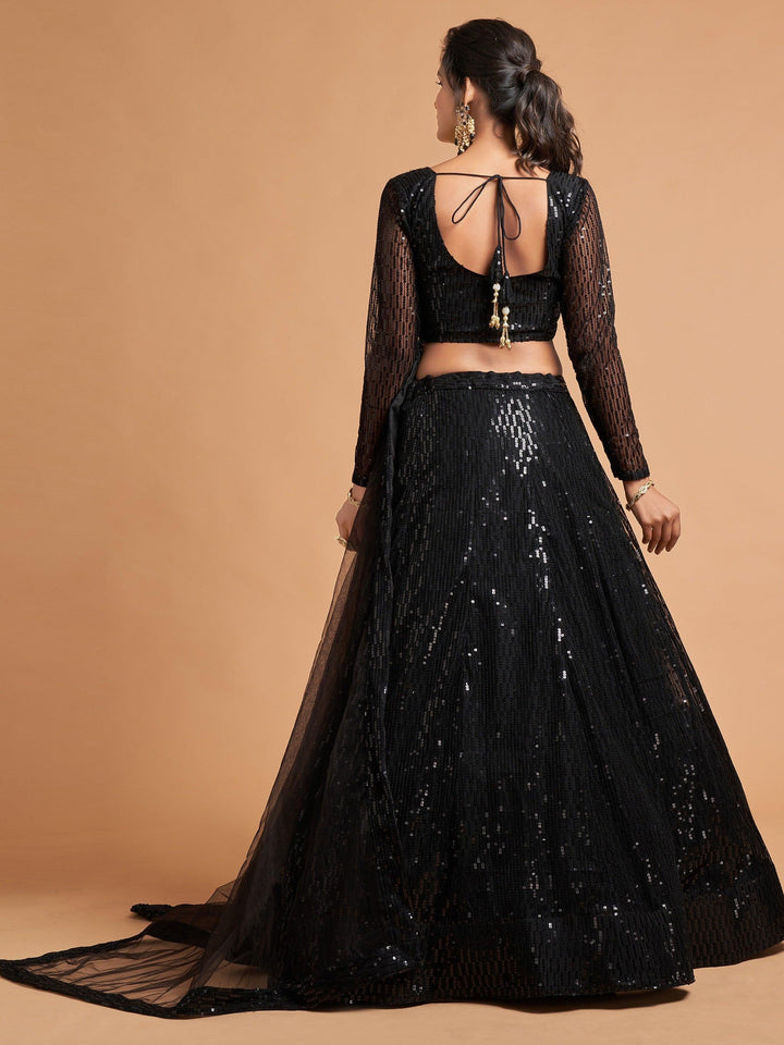 Semi-stitched black lehenga with custom fit option for a personalized look.
