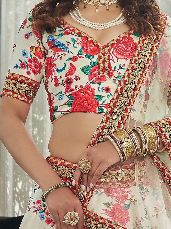 Bridal off-white lehenga with floral print and embroidered lace.