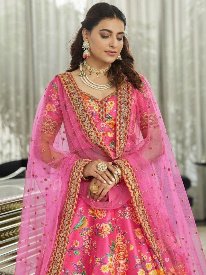 Art silk deep pink lehenga with matching choli and soft net dupatta.