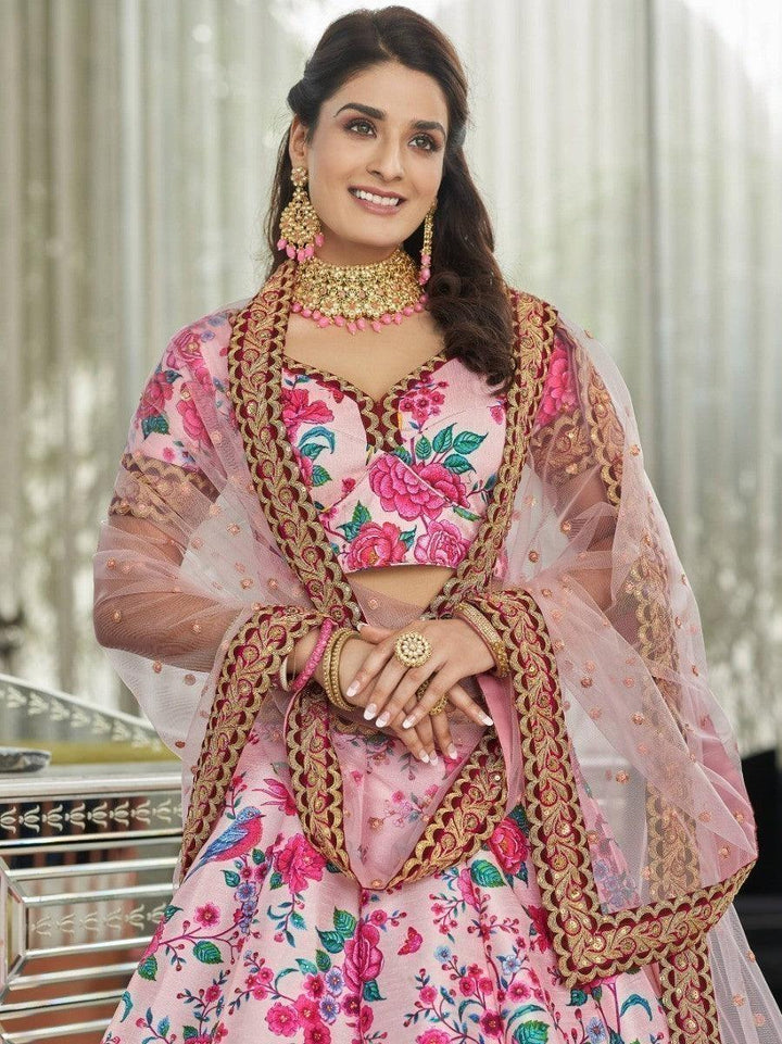 Graceful pink lehenga dress with art silk fabric, perfect for festive and wedding wear.