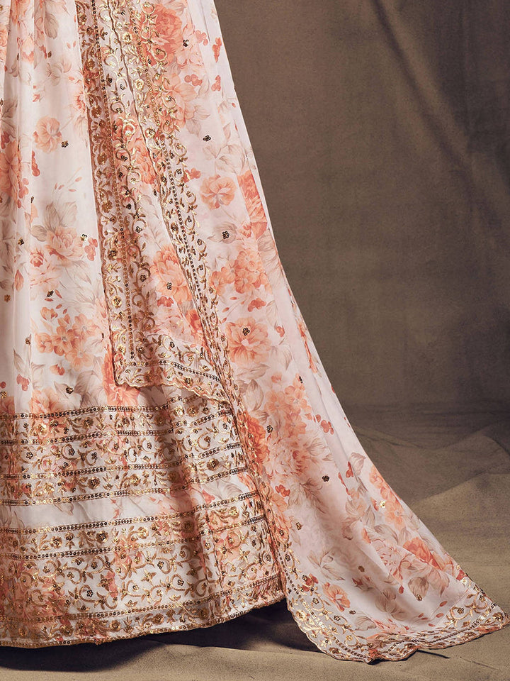 Elegant white lehenga with floral design and sequin embroidery