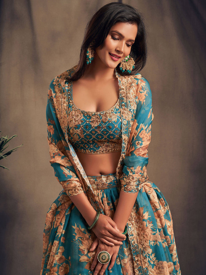 Floral printed teal lehenga with zari and sequins embroidery detail