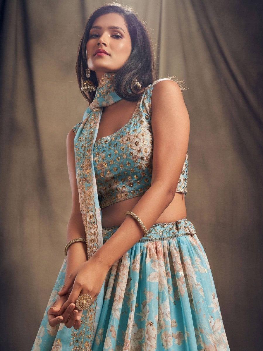 Bridal sky blue lehenga with matching choli and dupatta for ceremonies.