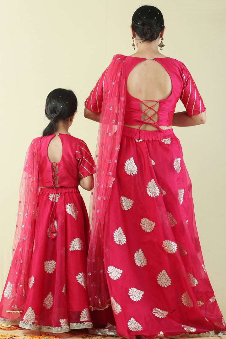 Fuchsia Pink and Golden Brocade Lehenga Choli Mom and Daughter Twin Set