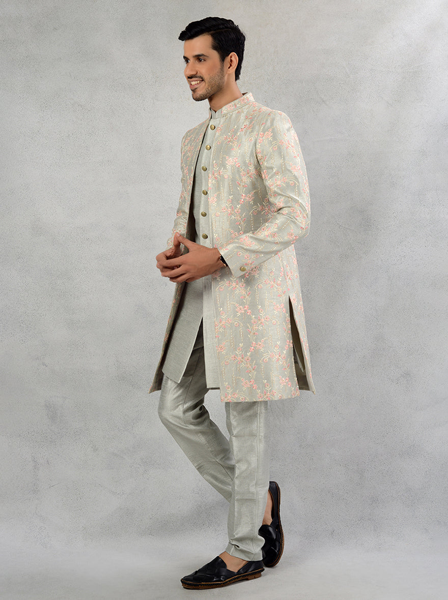 Embrace tradition with a twist in this exquisite Pista Green Indo Western, tailored for memorable events.