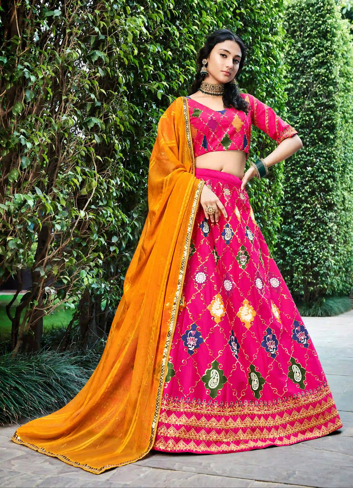 Sophisticated Pink Silk Lehenga with Yellow Dupatta | Crafted for Timeless Elegance