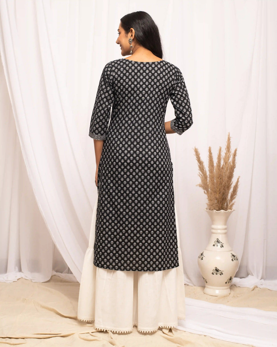 Black Designer Cotton Kurti | Portrait Neckline & Sophisticated Prints