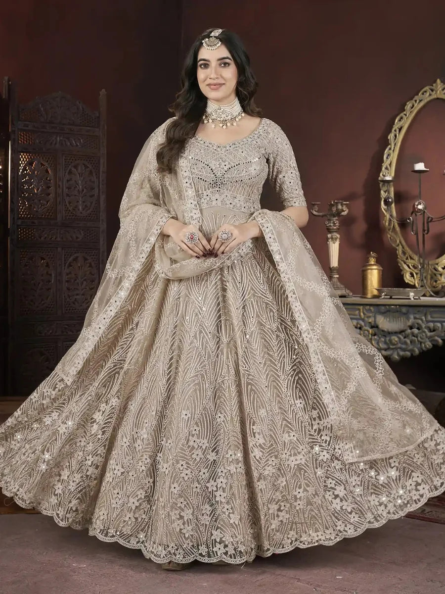 Detail view net material Anarkalili beige net embroidered Anarkalili suit.