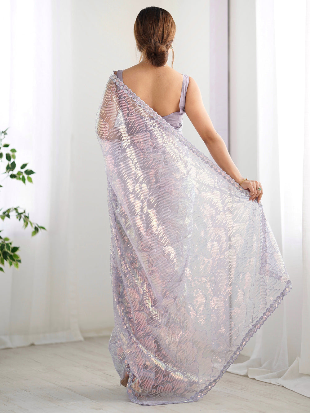 Charming Lavender Sequins Net Party Wear Saree With Blouse