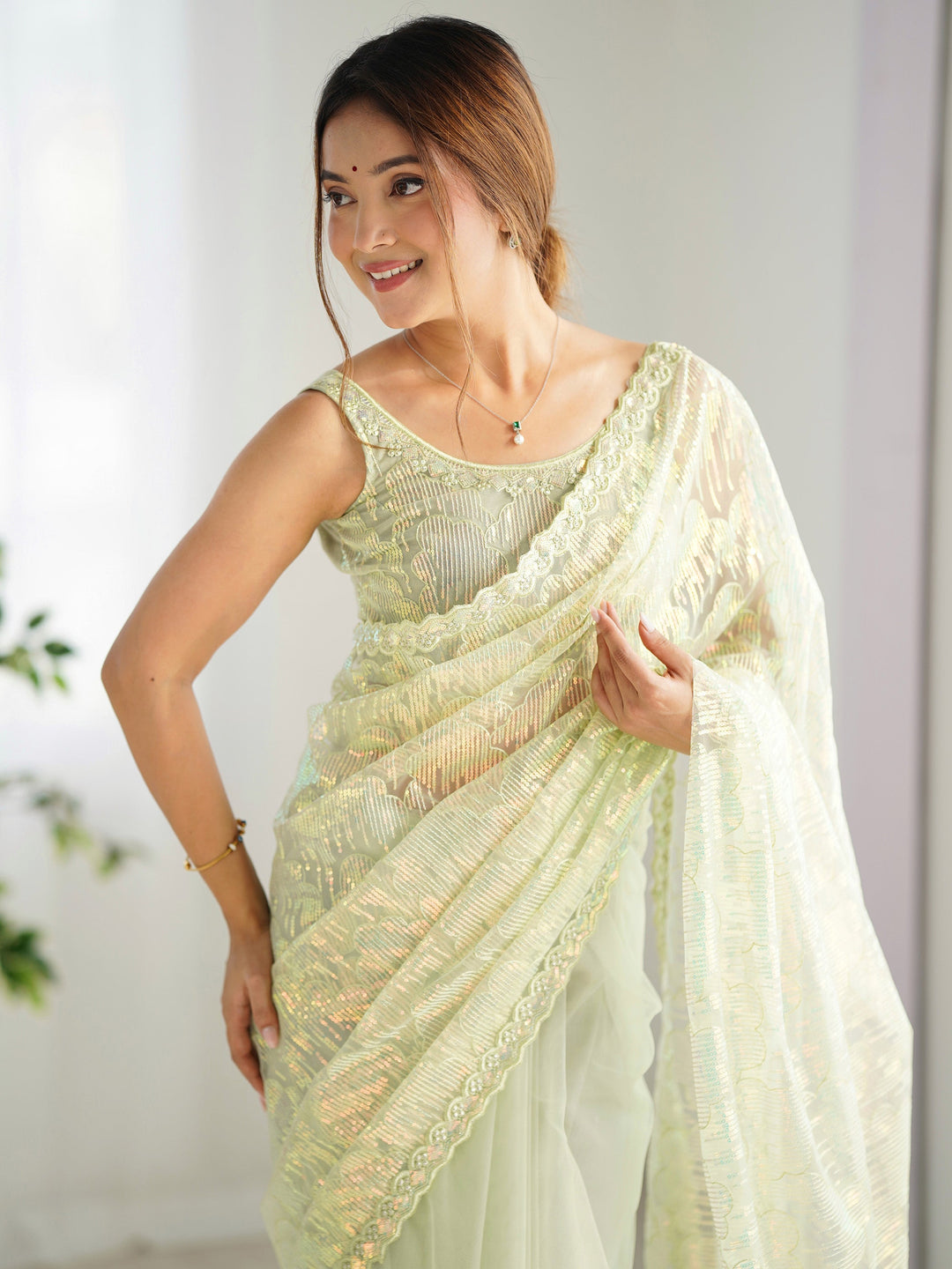 Attractive Pista Green Sequins Net Festival Wear Saree With Blouse