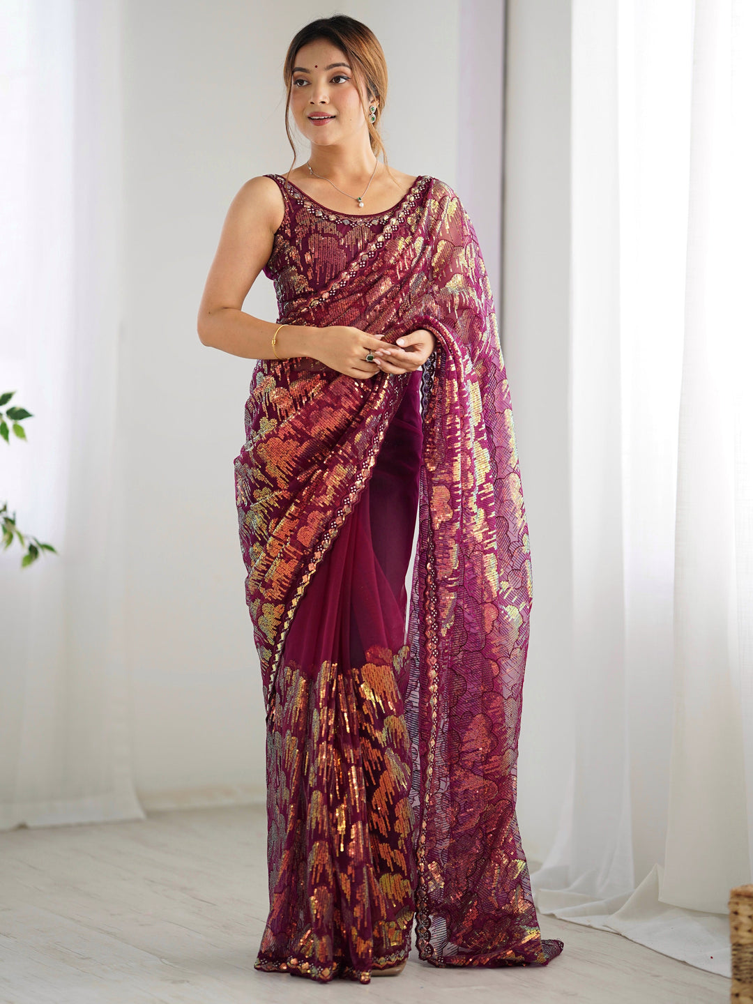Bewitching Wine Sequins Net Reception Wear Saree With Blouse