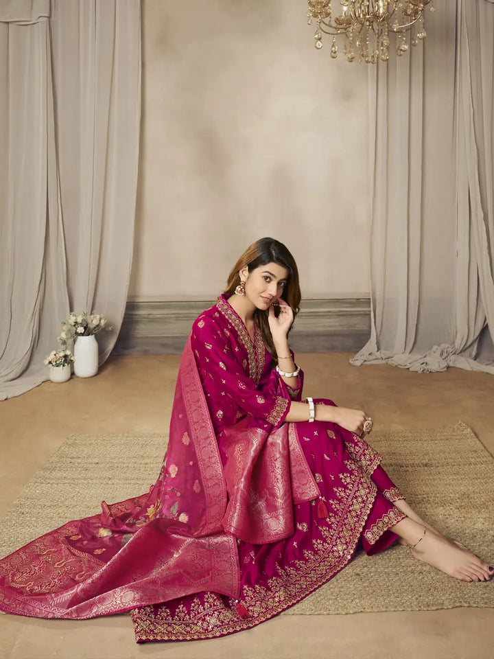 Front view pink silk i with gold embroidery work.