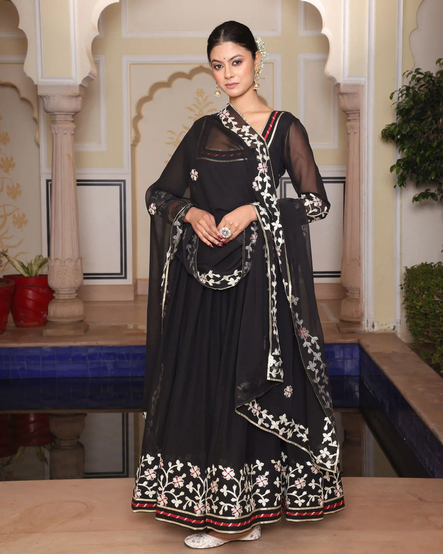 Detail view Georgrttette material Anarkalili black Georgrtte Anarkali suit with embroidered floral work and embroidered embroidery work.